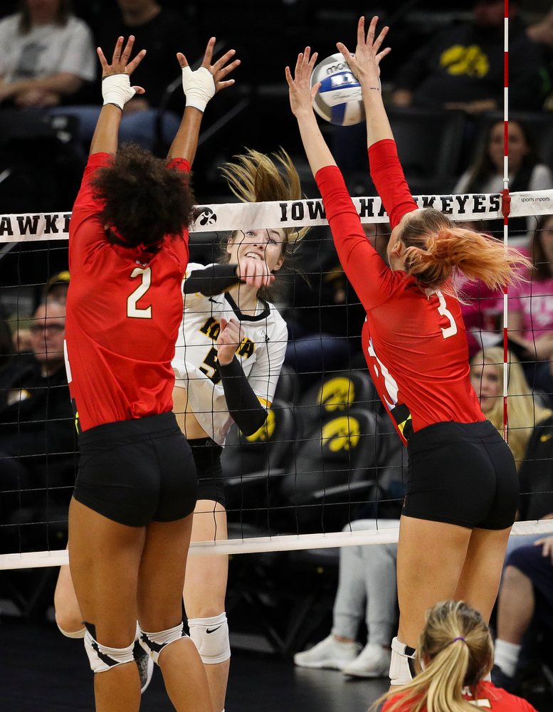 Iowa Hawkeyes outside hitter Meghan Buzzerio (5) spikes the ball during a match against Maryland at Carver-Hawkeye Arena on November 23, 2018. (Tork Mason/hawkeyesports.com)