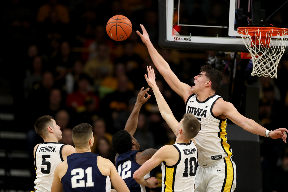 Iowa Hawkeyes forward Luka Garza (55) blocks a shot against Penn State Saturday, February 29, 2020 at Carver-Hawkeye Arena. (Brian Ray/hawkeyesports.com)