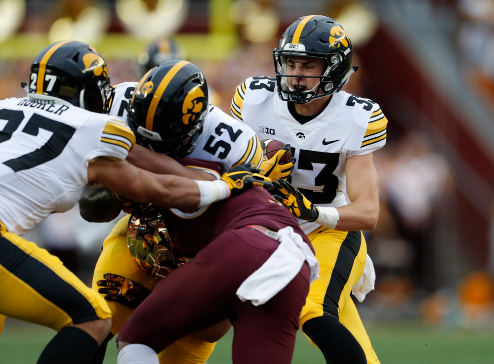 Iowa Hawkeyes defensive back Riley Moss (33) intercepts a pass against the Minnesota Golden Gophers Saturday, October 6, 2018 at TCF Bank Stadium. (Brian Ray/hawkeyesports.com)