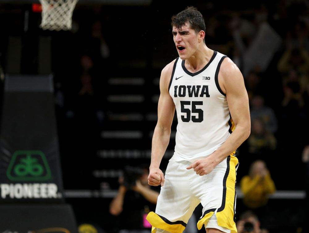 Iowa Hawkeyes forward Luka Garza (55) celebrates a three point basket against the Maryland Terrapins Friday, January 10, 2020 at Carver-Hawkeye Arena. (Brian Ray/hawkeyesports.com)