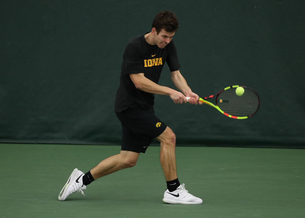 Iowa's Piotr Smietana against UMKC Friday, February 15, 2019 at the Hawkeye Tennis and Recreation Complex. (Brian Ray/hawkeyesports.com)