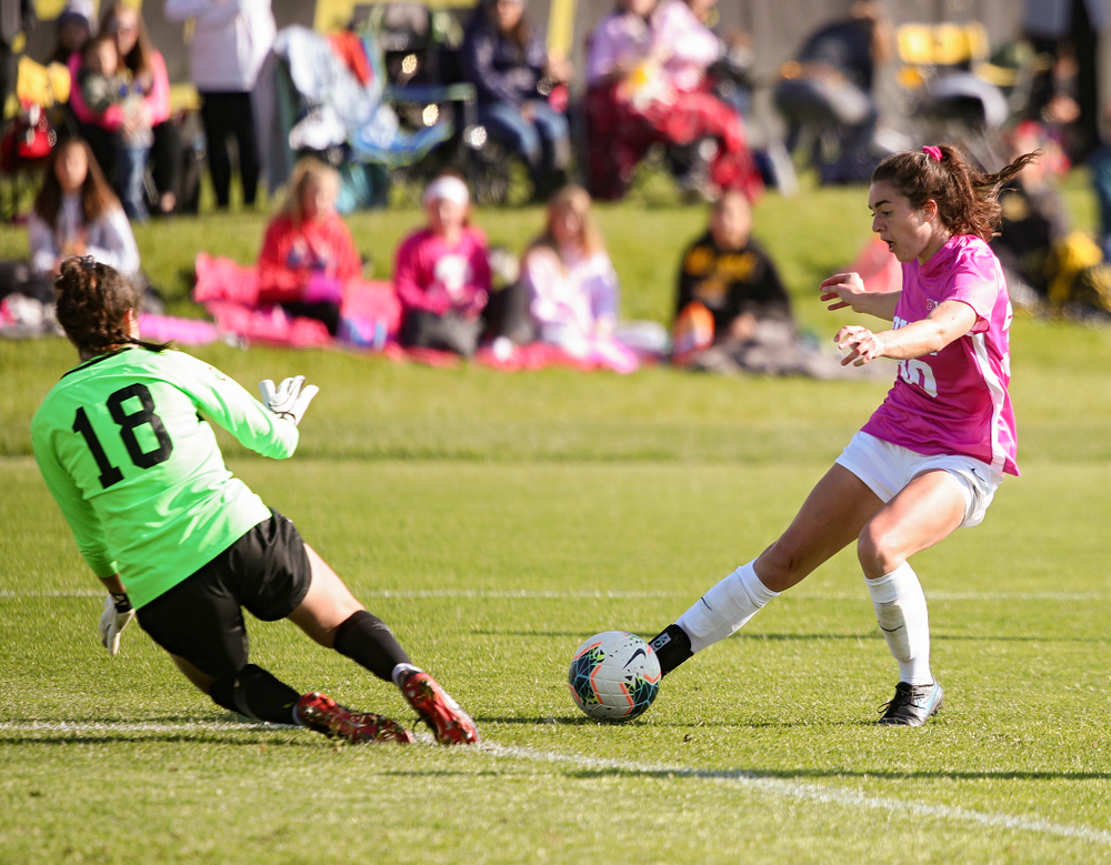 Iowa forward Devin Burns (30) tries to get a shot by the goalkeeper during the second half of their match at the Iowa Soccer Complex in Iowa City on Sunday, Oct 27, 2019. (Stephen Mally/hawkeyesports.com)