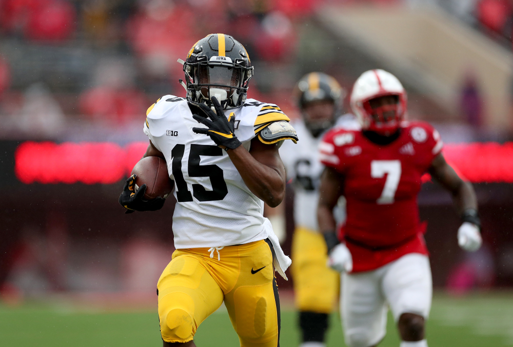 Iowa Hawkeyes running back Tyler Goodson (15) scores on a long touchdown run against the Nebraska Cornhuskers Friday, November 29, 2019 at Memorial Stadium in Lincoln, Neb. (Brian Ray/hawkeyesports.com)