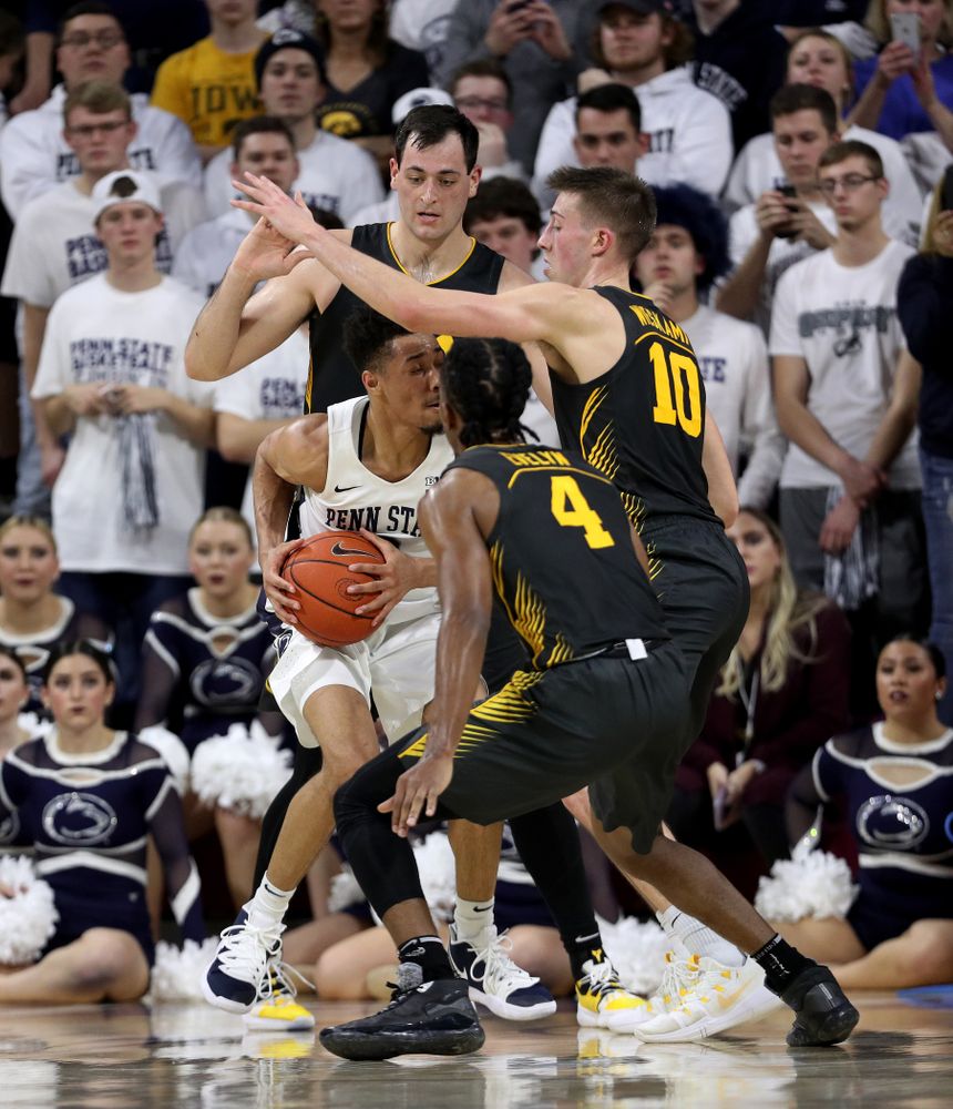 Iowa Hawkeyes forward Ryan Kriener (15), guard Joe Wieskamp (10), and guard Bakari Evelyn (4) against Penn State Saturday, January 4, 2020 at the Palestra in Philadelphia. (Brian Ray/hawkeyesports.com)