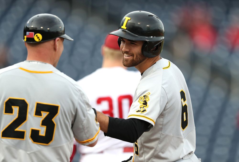 Iowa Hawkeyes outfielder Justin Jenkins (6) singles against the Indiana Hoosiers in the first round of the Big Ten Baseball Tournament Wednesday, May 22, 2019 at TD Ameritrade Park in Omaha, Neb. (Brian Ray/hawkeyesports.com)
