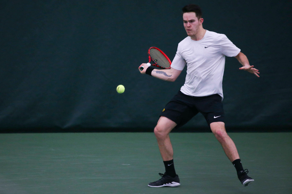 Iowa's Jonas Larsen at a tennis match vs Drake Friday, March 8, 2019 at the Hawkeye Tennis and Recreation Complex. (Lily Smith/hawkeyesports.com)