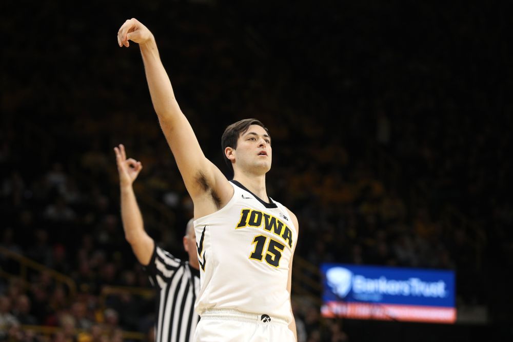 Iowa Hawkeyes forward Ryan Kriener (15) knocks down a three point basket against the Michigan Wolverines Friday, February 1, 2019 at Carver-Hawkeye Arena. (Brian Ray/hawkeyesports.com)