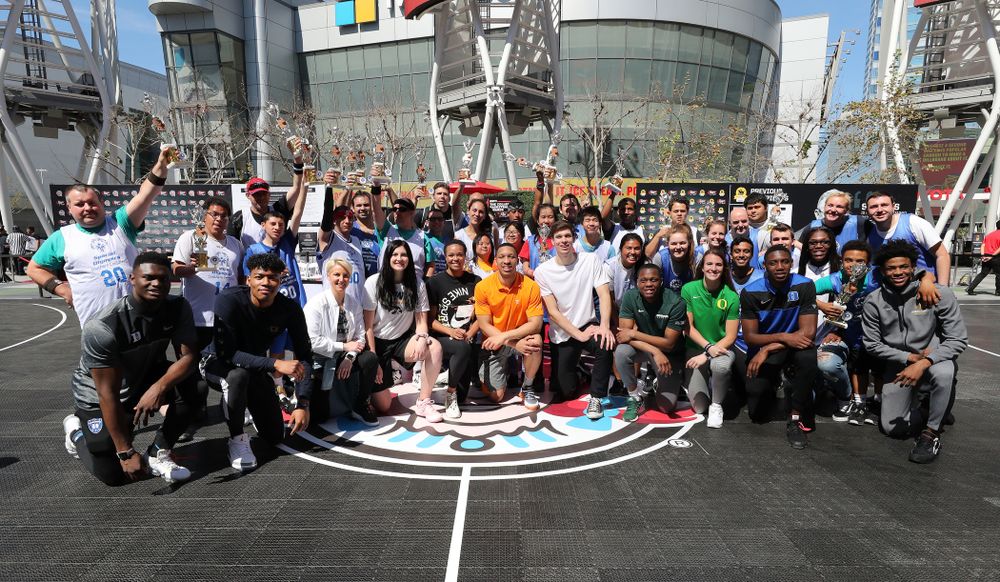 Iowa Hawkeyes forward Megan Gustafson (10) with the other ESPN College Basketball Awards honorees during a Special Olympics event Friday, April 12, 2019 as part of the ESPN College Basketball Awards in the XBOX Plaza at LA Live. (Brian Ray/hawkeyesports.com)