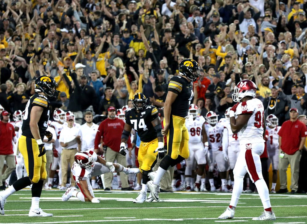 Iowa Hawkeyes quarterback Nate Stanley (4) celebrates a touchdown against the Miami RedHawks Saturday, August 31, 2019 at Kinnick Stadium in Iowa City. (Brian Ray/hawkeyesports.com)