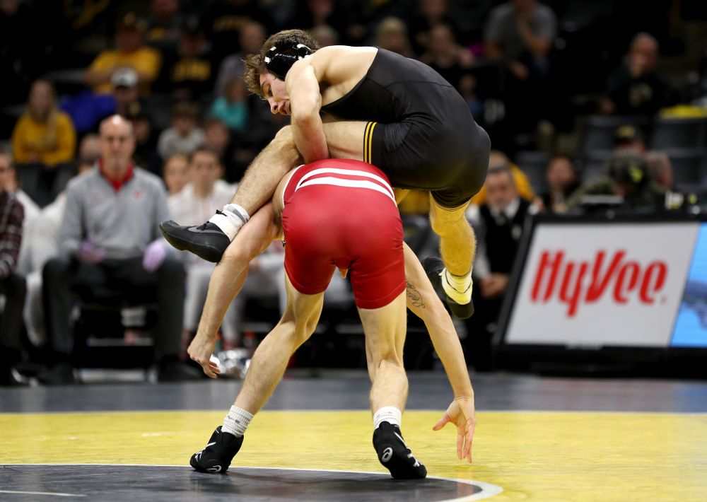 IowaÕs Austin DeSanto wrestles WisconsinÕs Seth Gross at 133 pounds Sunday, December 1, 2019 at Carver-Hawkeye Arena. DeSanto won the match 6-2. (Brian Ray/hawkeyesports.com)