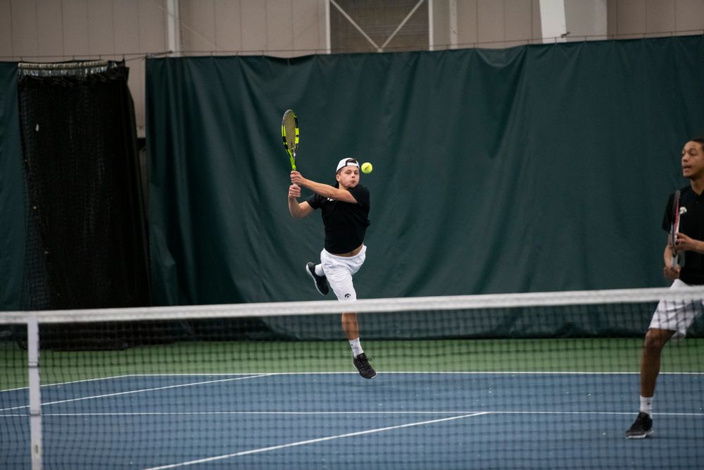 The Iowa men's tennis team competes against Cornell in The Rise Tennis Center in Ithaca, NY on Sunday, Feb. 24, 2019.
