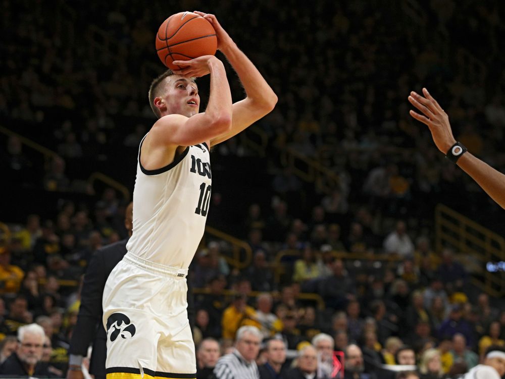 Iowa Hawkeyes guard Joe Wieskamp (10) lines up a shot during the first half of their their game at Carver-Hawkeye Arena in Iowa City on Sunday, December 29, 2019. (Stephen Mally/hawkeyesports.com)
