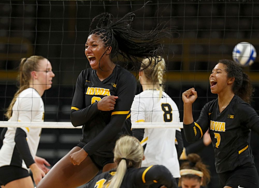 Iowa’s Amiya Jones (9) and Brie Orr (7) celebrate during the first set of the Black and Gold scrimmage at Carver-Hawkeye Arena in Iowa City on Saturday, Aug 24, 2019. (Stephen Mally/hawkeyesports.com)