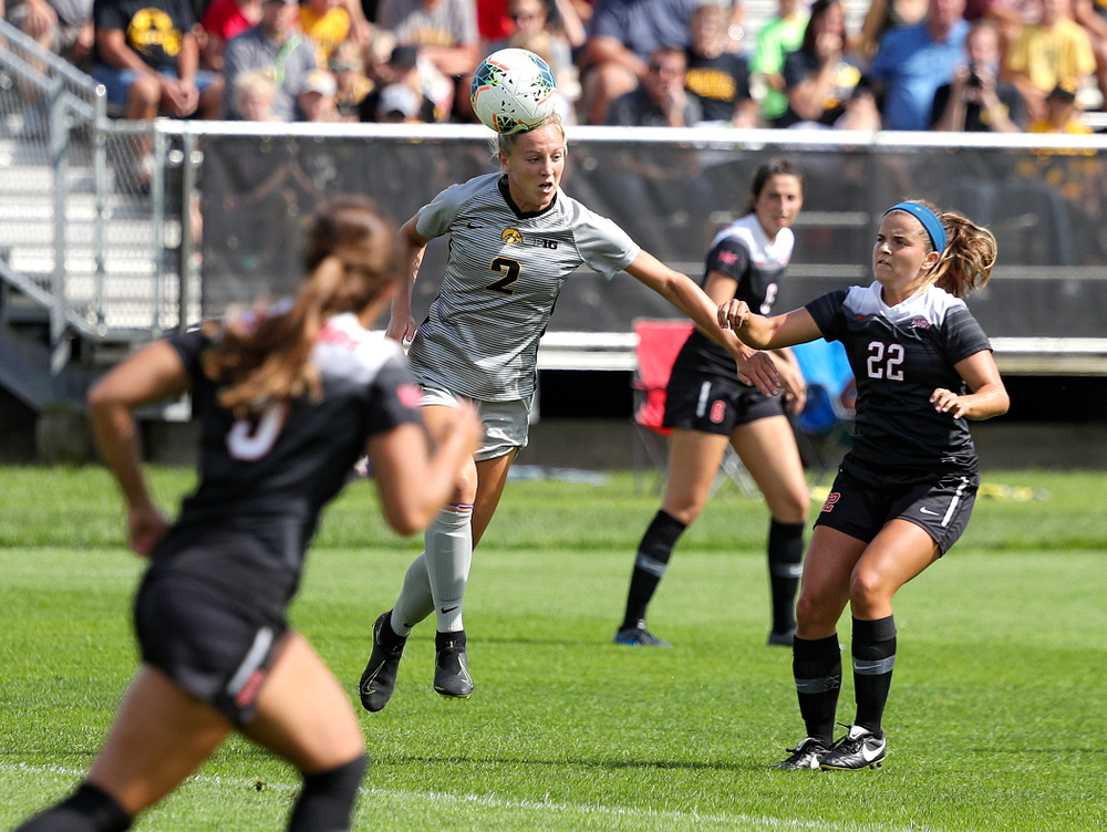 Iowa midfielder Hailey Rydberg (2) wins a header during the first half of their match at the Iowa Soccer Complex in Iowa City on Sunday, Sep 1, 2019. (Stephen Mally/hawkeyesports.com)