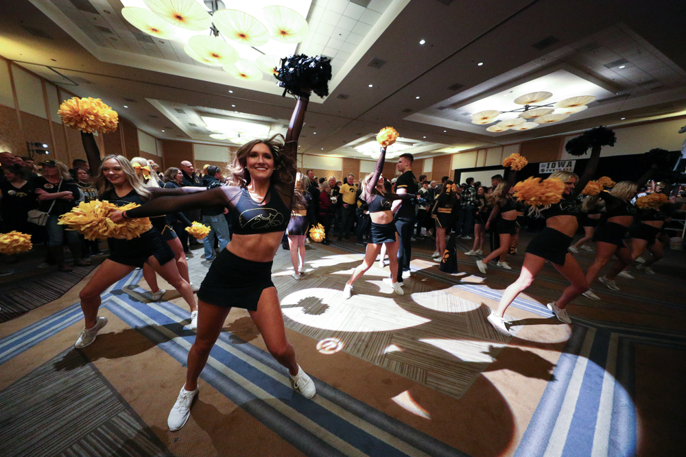 The Hawkeye Marching Band and the Iowa Spirit Squads perform during the Holiday Bowl Hawkeye Huddle Thursday, December 26, 2019 at the Hilton in downtown San Diego. (Brian Ray/hawkeyesports.com)