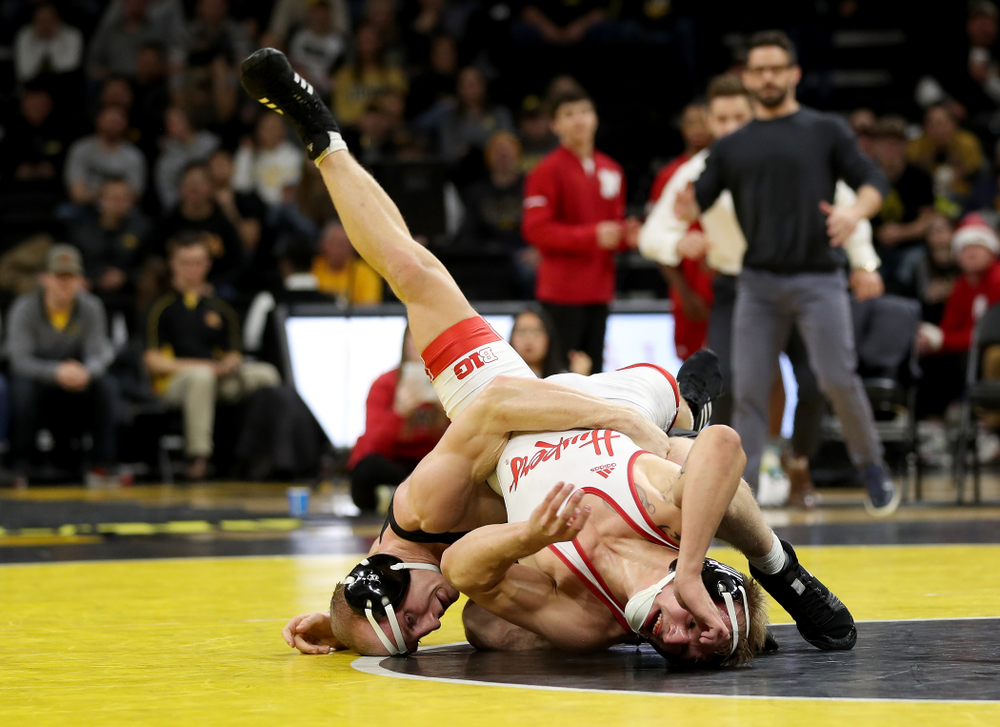 Iowa’s Kaleb Young wrestles Nebraska’s Peyton Rob at 157 pounds Saturday, January 18, 2020 at Carver-Hawkeye Arena. Young won the match 6-4. (Brian Ray/hawkeyesports.com)