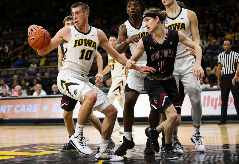 Iowa Hawkeyes guard Joe Wieskamp (10) grabs a rebound during a game against Guilford College at Carver-Hawkeye Arena on November 4, 2018. (Tork Mason/hawkeyesports.com)
