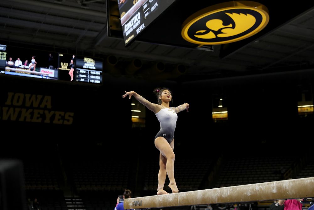 IowaÕs Clair Kaji competes on the beam against Ball State and Air Force Saturday, January 11, 2020 at Carver-Hawkeye Arena. (Brian Ray/hawkeyesports.com)