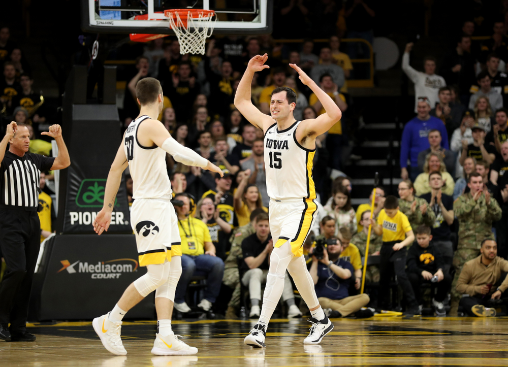 Iowa Hawkeyes forward Ryan Kriener (15) pumps up the fans against Penn State Saturday, February 29, 2020 at Carver-Hawkeye Arena. (Brian Ray/hawkeyesports.com)