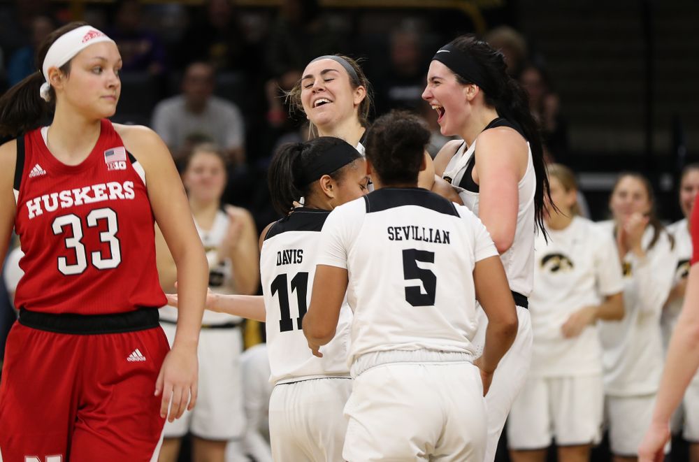 Iowa Hawkeyes forward Megan Gustafson (10), forward Hannah Stewart (21), guard Tania Davis (11), and guard Alexis Sevillian (5) against the Nebraska Cornhuskers Thursday, January 3, 2019 at Carver-Hawkeye Arena. (Brian Ray/hawkeyesports.com)