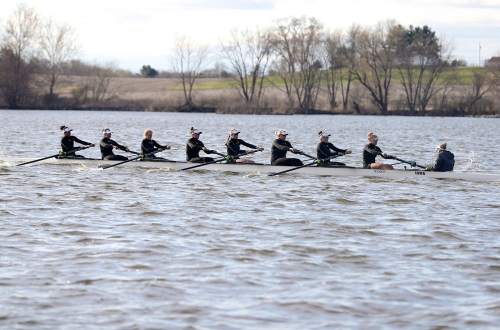 Iowa's Naomi Visser (from left), Elena Waiglein, Paige Schlapkohl, Hannah Greenlee, Hunter Koenigsfeld, Contessa Harold, Katie Pearson, Eve Stewart, and Logan Jones during their I Varsity 8 race against Minnesota in their Big Ten Double Dual Rowing Regatta at Lake Macbride in Solon on Saturday, Apr. 13, 2019. (Stephen Mally/hawkeyesports.com)