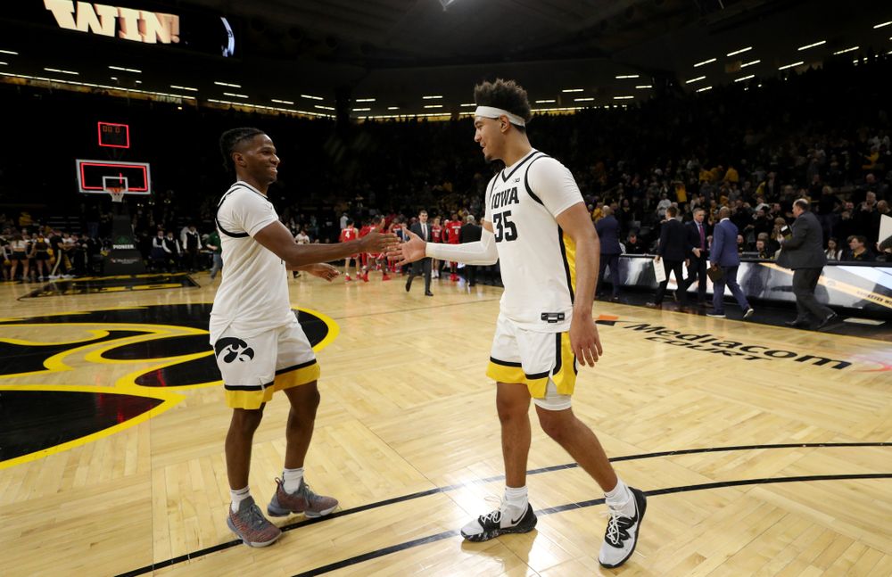 Iowa Hawkeyes guard Bakari Evelyn (4) and forward Cordell Pemsl (35) against the Ohio State Buckeyes Thursday, February 20, 2020 at Carver-Hawkeye Arena. (Brian Ray/hawkeyesports.com)