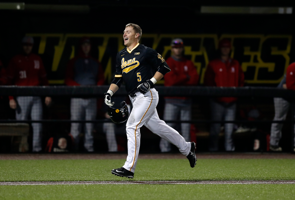 Iowa Hawkeyes catcher Tyler Cropley (5) celebrates after hitting a walk off grand slam in the bottom of the ninth against the Bradley Braves Wednesday, March 28, 2018 at Duane Banks Field. (Brian Ray/hawkeyesports.com)