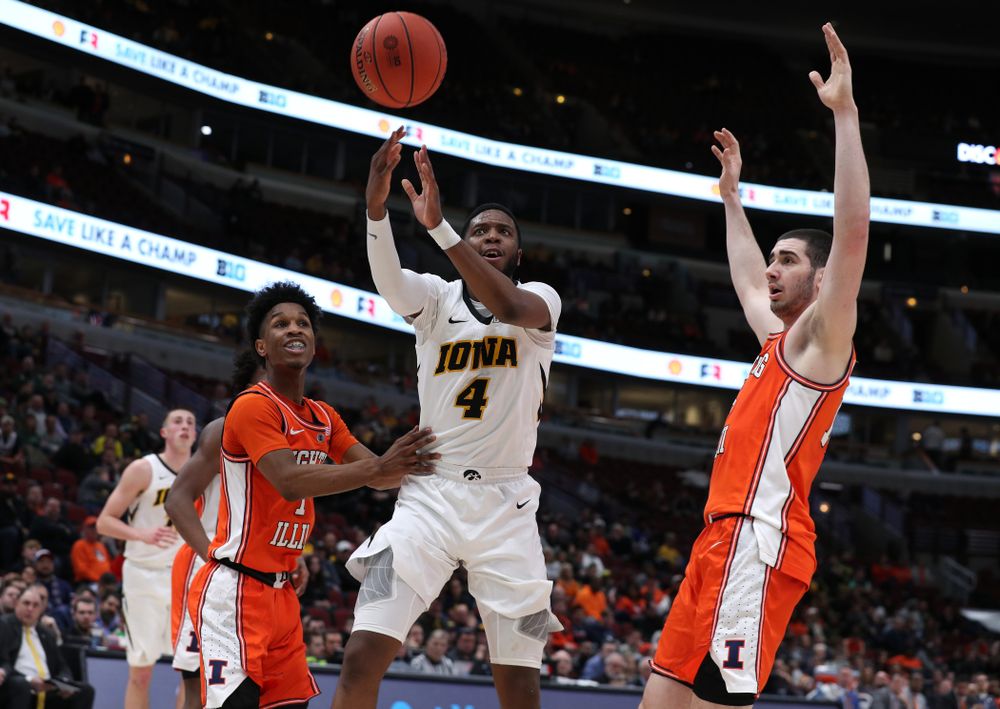 Iowa Hawkeyes guard Isaiah Moss (4) against the Illinois Fighting Illini in the 2019 Big Ten Men's Basketball Tournament Thursday, March 14, 2019 at the United Center in Chicago. (Brian Ray/hawkeyesports.com)