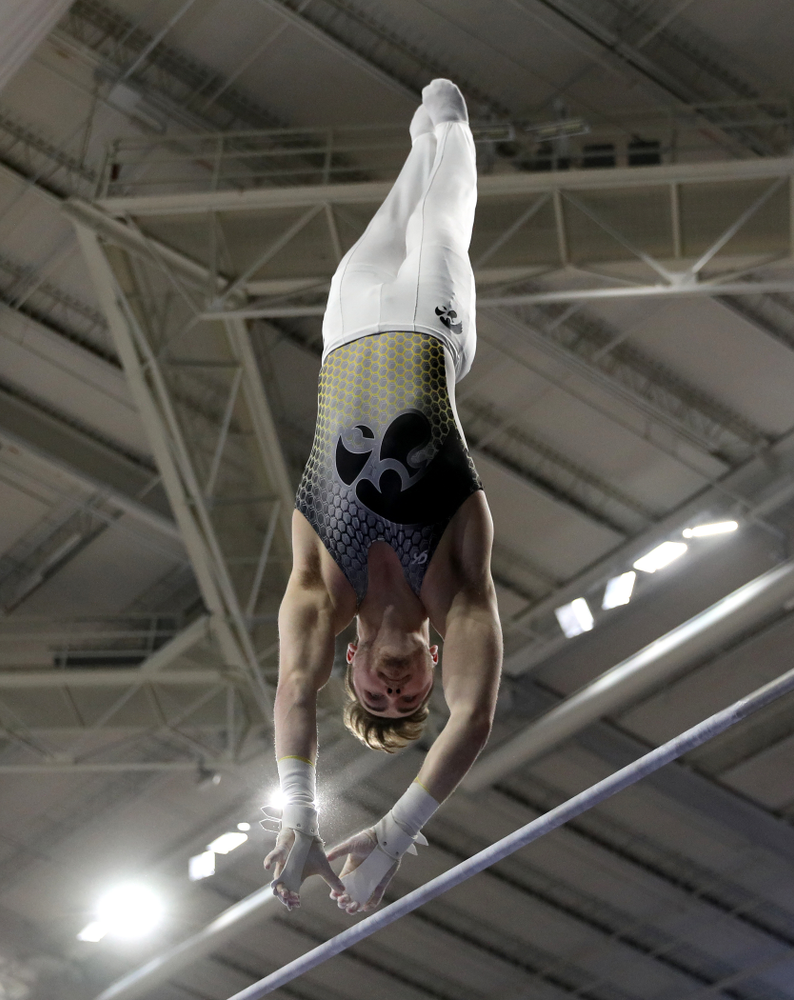 Iowa’s Alex Walther competes on the high bar against UIC and Minnesota Saturday, February 1, 2020 at Carver-Hawkeye Arena. (Brian Ray/hawkeyesports.com)