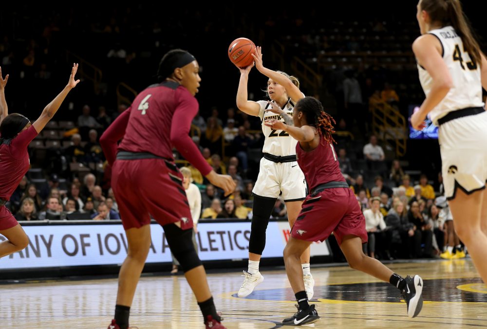 Iowa Hawkeyes guard Kathleen Doyle (22) knocks down a three point basket against North Carolina Central Saturday, December 14, 2019 at Carver-Hawkeye Arena. (Brian Ray/hawkeyesports.com)