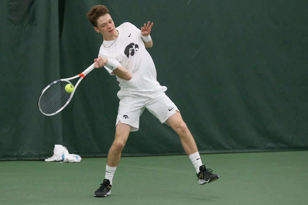 Iowa’s Jason Kerst returns a hit during the Iowa men’s tennis meet vs Nebraska on Sunday, March 1, 2020 at the Hawkeye Tennis and Recreation Complex. (Lily Smith/hawkeyesports.com)
