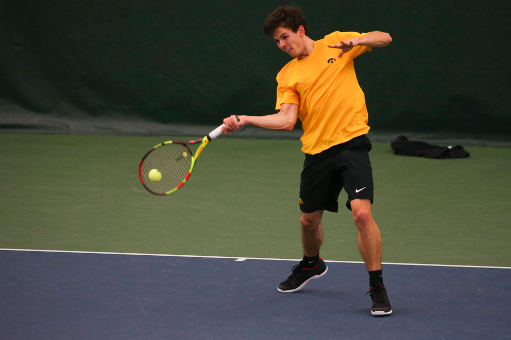 Iowa's Joe Tyler at a tennis match vs Drake Friday, March 8, 2019 at the Hawkeye Tennis and Recreation Complex. (Lily Smith/hawkeyesports.com)