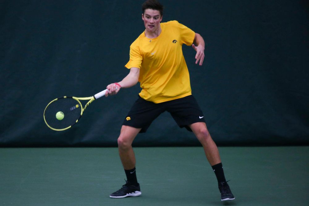 Iowa's Piotr Smietana at a tennis match vs Drake Friday, March 8, 2019 at the Hawkeye Tennis and Recreation Complex. (Lily Smith/hawkeyesports.com)