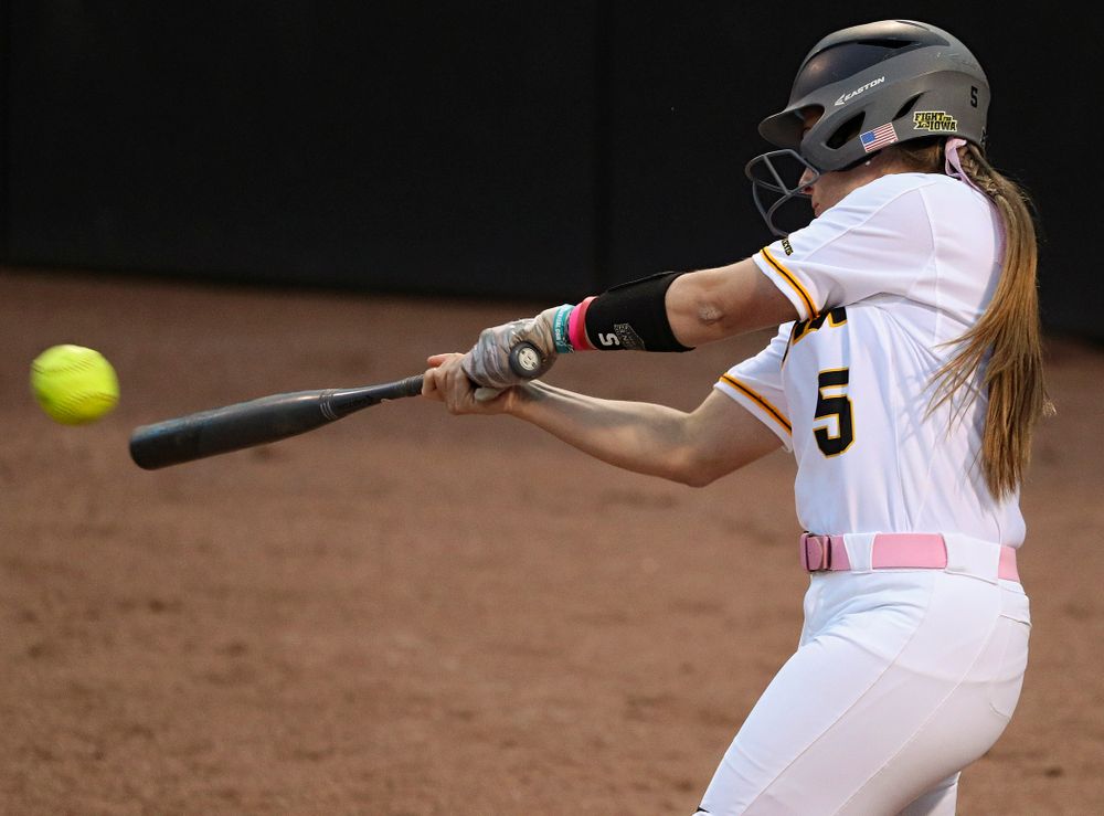Iowa shortstop Sydney Owens (5) hits a double during the fifth inning of their game against Iowa State at Pearl Field in Iowa City on Tuesday, Apr. 9, 2019. (Stephen Mally/hawkeyesports.com)