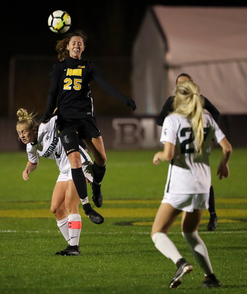Iowa Hawkeyes midfielder Josie Durr (25) heads the ball during a game against Michigan State at the Iowa Soccer Complex on October 12, 2018. (Tork Mason/hawkeyesports.com)
