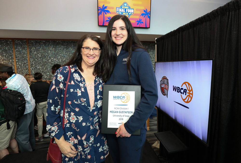 Iowa Hawkeyes forward Megan Gustafson (10) and her mother Eva Wednesday, April 4, 2018 at Amalie Arena in Tampa, FL. (Brian Ray/hawkeyesports.com)