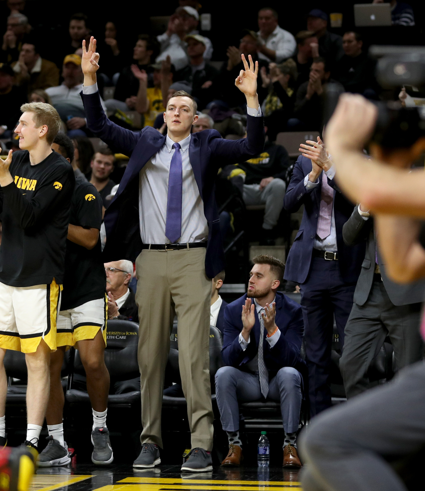 Iowa Hawkeyes forward Jack Nunge (2), guard Jordan Bohannon (3), and forward Patrick McCaffery (22) against the Maryland Terrapins Friday, January 10, 2020 at Carver-Hawkeye Arena. (Brian Ray/hawkeyesports.com)
