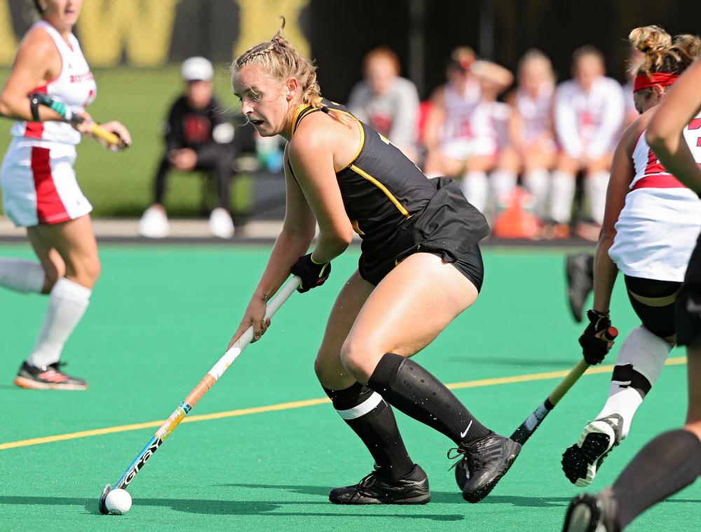 Iowa’s Katie Birch (11) spins with the ball during the first quarter of their match at Grant Field in Iowa City on Friday, Oct 4, 2019. (Stephen Mally/hawkeyesports.com)