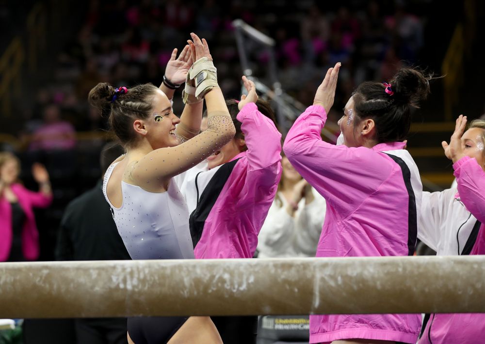 IowaÕs Allie Gilchrist competes on the beam against Ball State and Air Force Saturday, January 11, 2020 at Carver-Hawkeye Arena. (Brian Ray/hawkeyesports.com)
