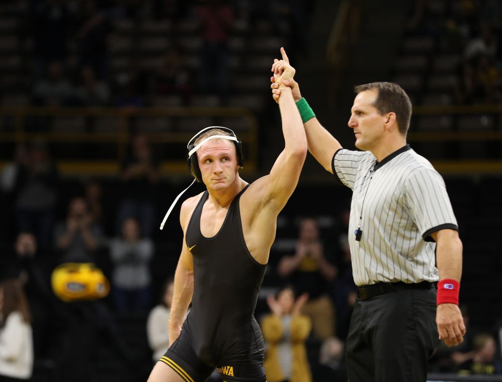 Iowa's Kaleb Young wrestles Purdue's Griffin Parriott at 157 pounds Saturday, November 24, 2018 at Carver-Hawkeye Arena. (Brian Ray/hawkeyesports.com)