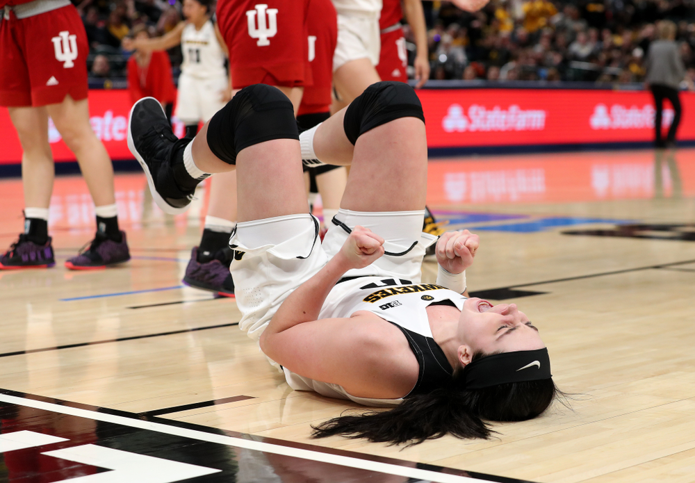 Iowa Hawkeyes forward Megan Gustafson (10) celebrates after making a basket and drawing a foul against the Indiana Hoosiers in the quarterfinals of the Big Ten Tournament Friday, March 8, 2019 at Bankers Life Fieldhouse in Indianapolis, Ind. (Brian Ray/hawkeyesports.com)