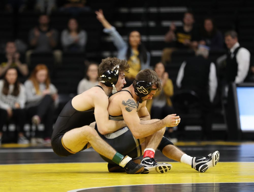 Iowa's Austin DeSanto wrestles Purdue's Ben Thornton at 133 pounds Saturday, November 24, 2018 at Carver-Hawkeye Arena. (Brian Ray/hawkeyesports.com)
