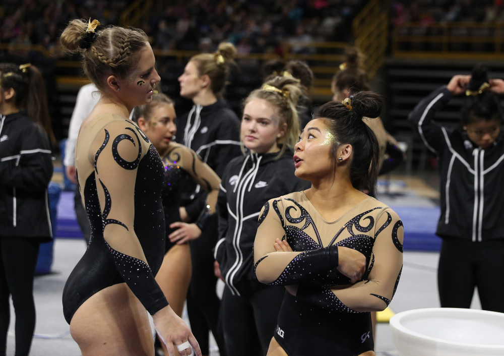 Iowa's Clair Kaji encourages teammate Emma Hartzler before her routine on the beam during their meet against Southeast Missouri State Friday, January 11, 2019 at Carver-Hawkeye Arena. (Brian Ray/hawkeyesports.com)