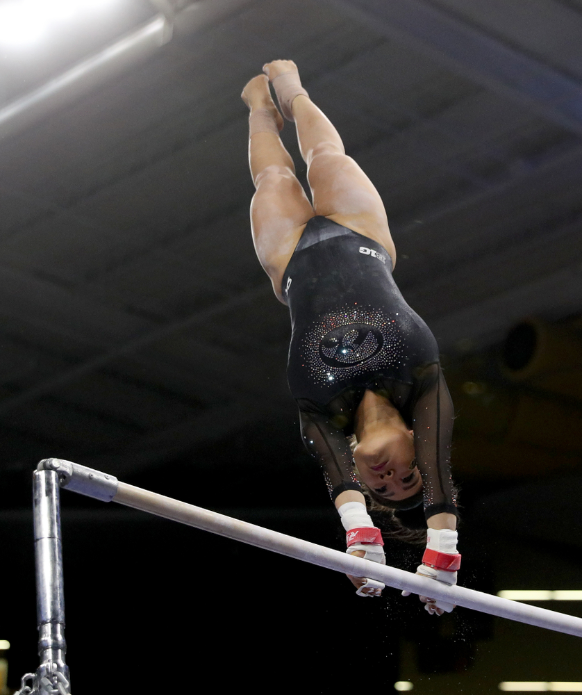 Iowa’s Clair Kaji competes on the bars against Michigan Friday, February 14, 2020 at Carver-Hawkeye Arena. (Brian Ray/hawkeyesports.com)