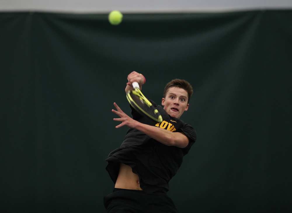 Joe Tyler against the Miami Hurricanes Friday, February 8, 2019 at the Hawkeye Tennis and Recreation Complex. (Brian Ray/hawkeyesports.com)