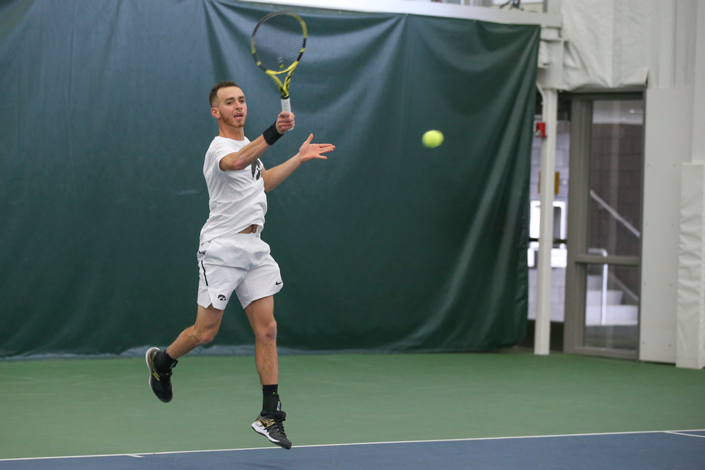 Iowa’s Kareem Allaf returns a hit during the Iowa men’s tennis meet vs Nebraska on Sunday, March 1, 2020 at the Hawkeye Tennis and Recreation Complex. (Lily Smith/hawkeyesports.com)