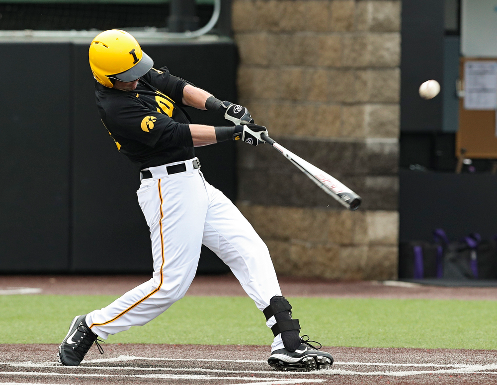 Iowa Hawkeyes left fielder Chris Whelan (28) drives a pitch for a hit during the first inning of their game against Western Illinois at Duane Banks Field in Iowa City on Wednesday, May. 1, 2019. (Stephen Mally/hawkeyesports.com)