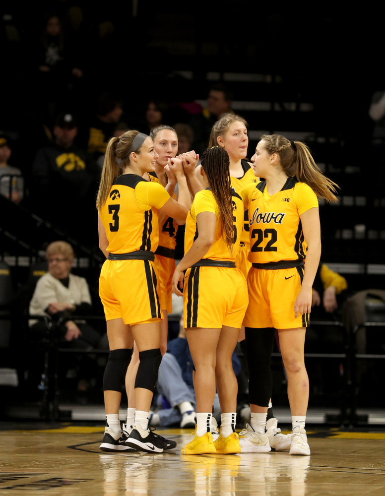 Iowa Hawkeyes guard Makenzie Meyer (3), forward Amanda Ollinger (43), forward/center Monika Czinano, guard Kathleen Doyle (22), and guard Alexis Sevillian (5) against the Minnesota Golden Gophers Thursday, February 27, 2020 at Carver-Hawkeye Arena. (Brian Ray/hawkeyesports.com)