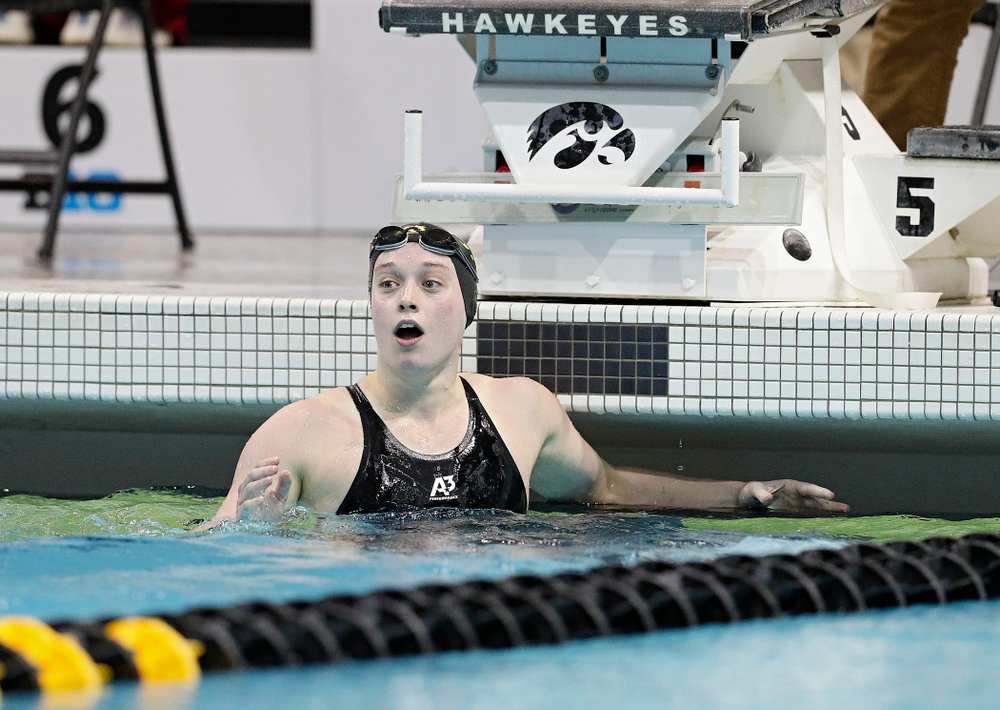 Iowa’s Kelsey Drake reacts as she looks a the video board and sees she broke a school record in a 200 yard butterfly time trial during the 2020 Big Ten Women’s Swimming and Diving Championships at the Campus Recreation and Wellness Center in Iowa City on Wednesday, February 19, 2020. (Stephen Mally/hawkeyesports.com)