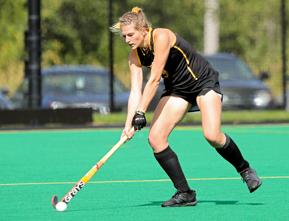 Iowa’s Ellie Holley (7) passes during the first quarter of their match at Grant Field in Iowa City on Friday, Oct 4, 2019. (Stephen Mally/hawkeyesports.com)